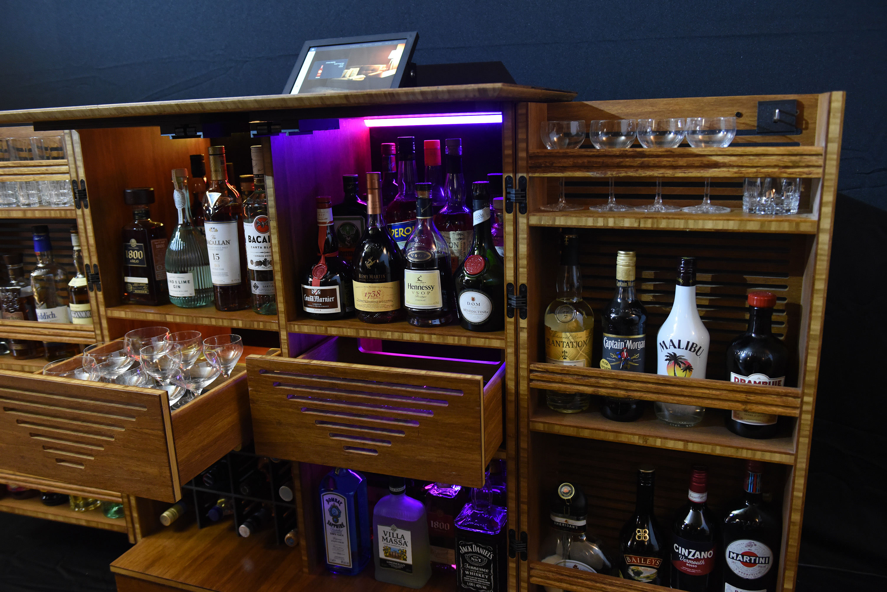 Barly cabinet open with full collection